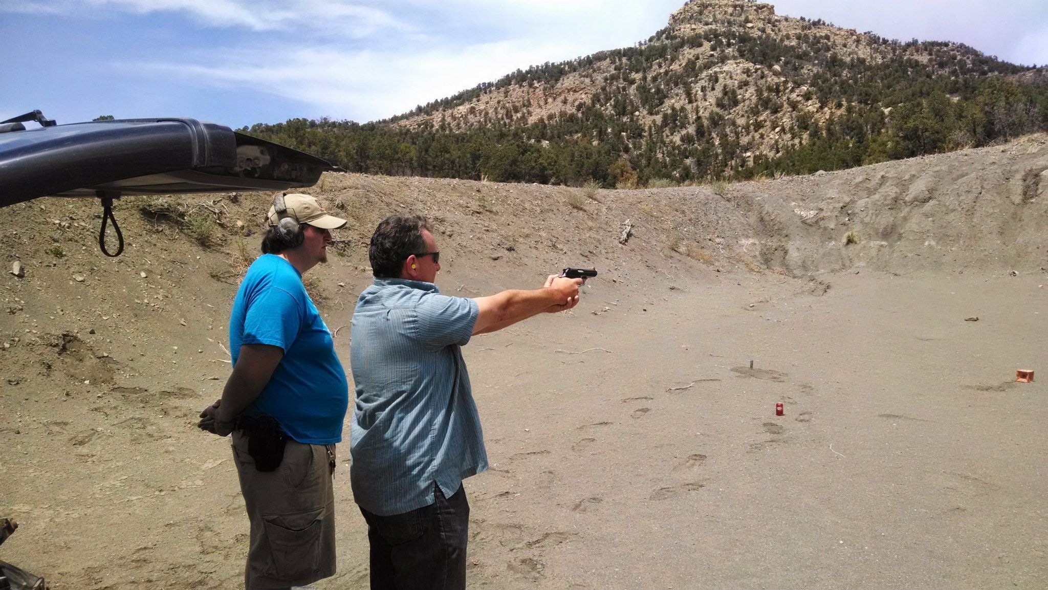 Tim and Pat shooting some guns
